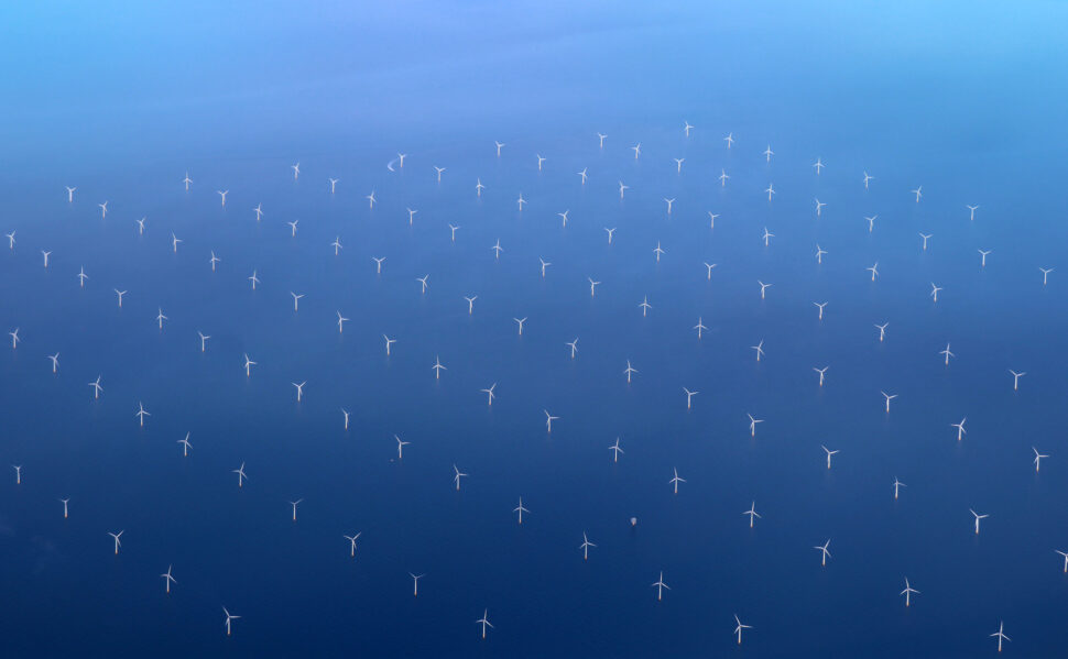 Photo of windmills in the ocean